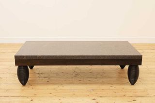 A porphyry-topped rectangular low table,