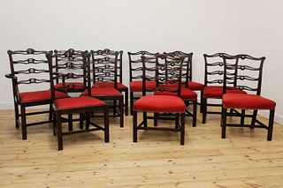 A set of twelve Chippendale-style mahogany dining chairs,
