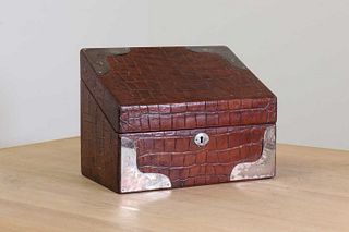 A crocodile skin stationery box by Asprey London,