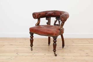 A Victorian walnut horseshoe backed chair,