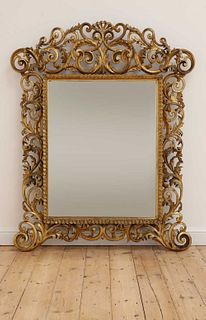 A carved giltwood Florentine mirror,