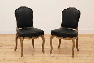 A pair of painted and parcel-gilt side chairs