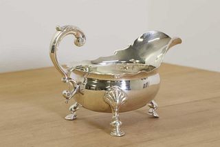 A George III silver sauce boat,