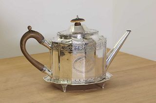 A George III silver teapot and stand,