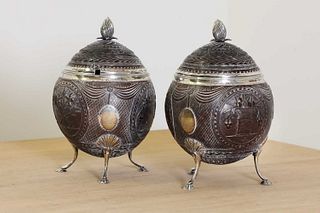 A pair of George III silver-mounted coconut tureens and covers,