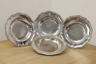A set of four George III silver dishes,
