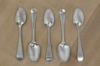 A small collection of 'picture back' teaspoons,