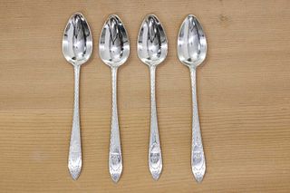 A set of four 18th century Irish silver dessert spoons,