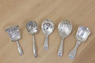 Five antique silver caddy spoons,