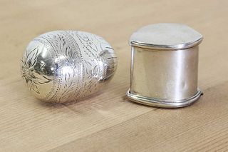 An unmarked silver nutmeg grater,