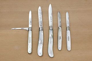 Five antique silver and mother-of-pearl folding fruit knives,