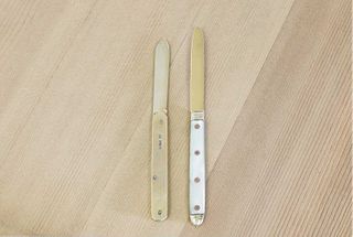 Two gold folding fruit knives,