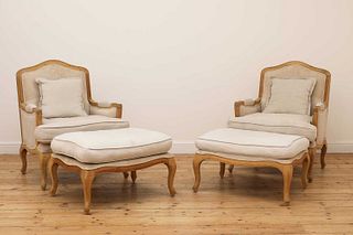 A pair of blonde oak fauteuils,