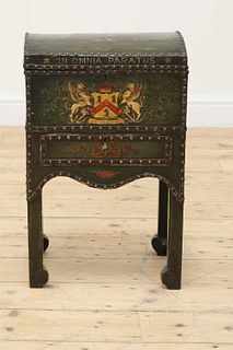 A domed, leather-bound trunk and stand,