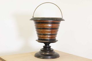 A walnut and ebonised kettle bucket,