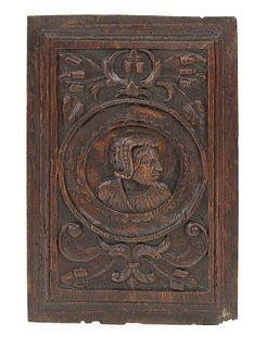 A set of four carved oak panels,