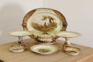 A Royal Worcester vitreous porcelain game service,