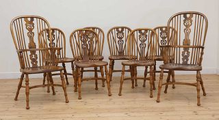 A set of eight elm and ash Windsor-style dining chairs,