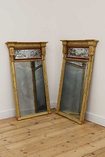 A pair of gilt-framed wall mirrors,