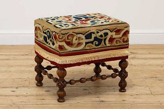 A walnut stool in the manner of A W N Pugin,