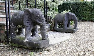 A pair of carved lava stone elephants,
