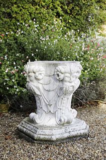 A pair of carved marble stands,