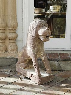 A carved red sandstone lion,