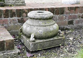 A pair of carved sandstone column bases,
