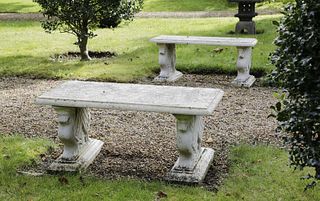 A pair of marble garden seats,