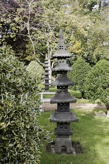 A pair of carved lava stone 'Meru towers',