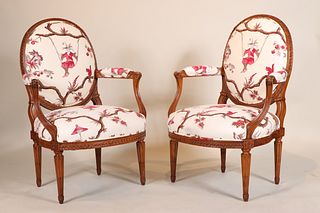 Two Louis XVI Style Carved Cherrywood Fauteuils