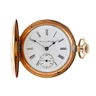 A full hunter pocket watch by Hampden Watch Company. Gold plated case. Numbered 7987724. Signed keyl