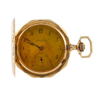 A full hunter pocket watch by Rigorosa. Yellow metal case, stamped 14K with poincon. Unsigned keyles