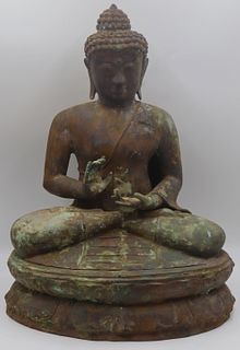 Seated Patinated Metal Buddha on Lotus Base.