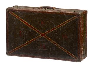 A Louis Vuitton hardshell suitcase
