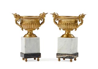 A pair of gilt-bronze and marble garniture urns