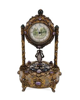 A Viennese enameled gilt-silver table clock