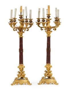A pair of gilt-bronze and marble candle lamps