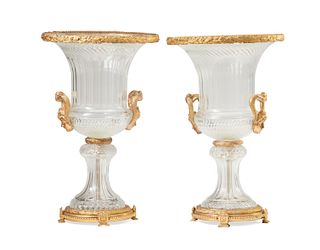 A pair of large Baccarat-style crystal urns