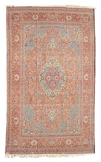 A Kashan area rug