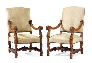 A pair of Italian carved wood armchairs