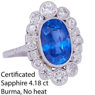 IMPORTANT 4.18 CT BURMA BLUE SAPPHIRE AND DIAMOND CLUSTER RING