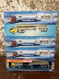 Five Amoco and Shell Toy Trucks