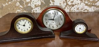 Three Humpback Clocks
