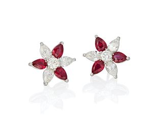 A pair of ruby and diamond flower earrings
