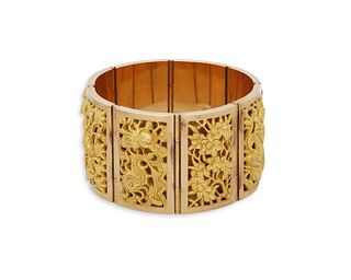 A gold Asian themed bracelet