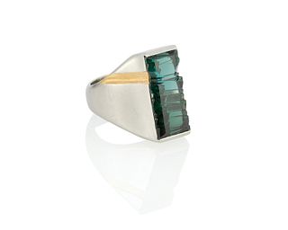 A carved green tourmaline ring