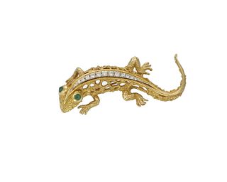 A diamond and emerald lizard brooch