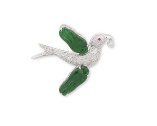 A jadeite and diamond humming bird brooch