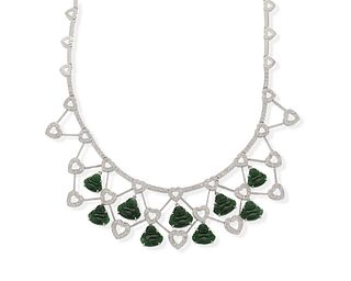 A jadeite and diamond Buddha necklace